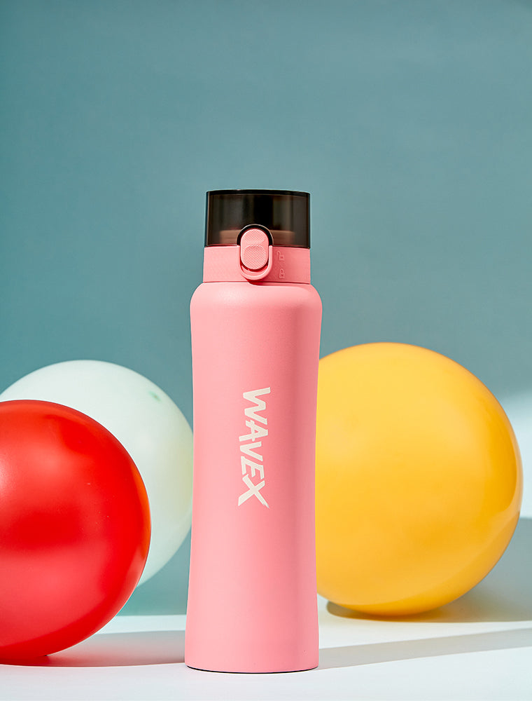 A pink steel water bottle (550ml) topped with a colorful balloon, showcasing a playful and vibrant design.